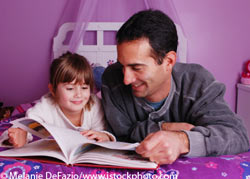 father and child reading in bedroom father and child reading in bedroom