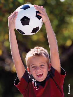 Boy holding a football