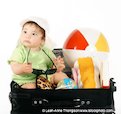 Boy in suitcase