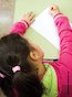 young girl writing