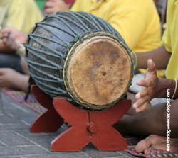 Man playing a drum Man playing a drum