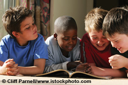 Young boys sharing a book Young boys sharing a book