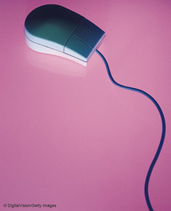 computer mouse on pink background