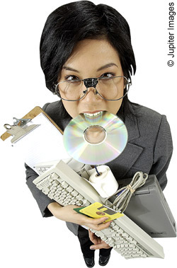 teacher carrying ICT equipment