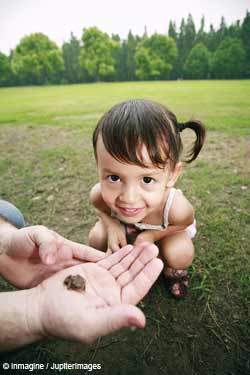 child with frog