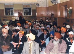 inside the gurdwara everyone sits on the floor to show they are equal