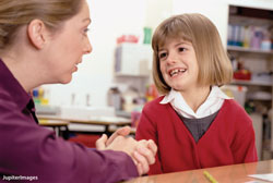 Teacher and child talking